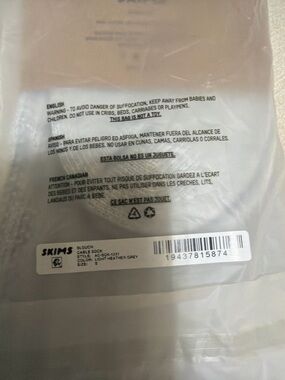 SKIMS slouchy ribbed socks in packaging. Message for bundle deal.